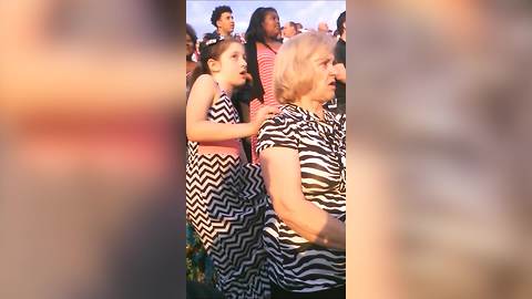 A Young Girl Takes Down Her Grandmother As She Falls At A Graduation Ceremony
