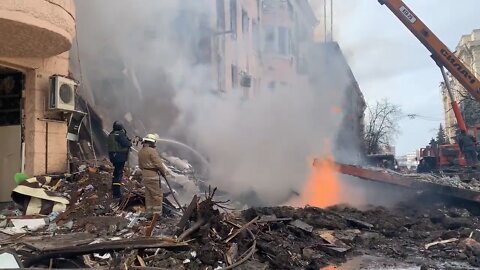 Ukrainian rescuers continue to put out the fire and search rubble after Russian bombings