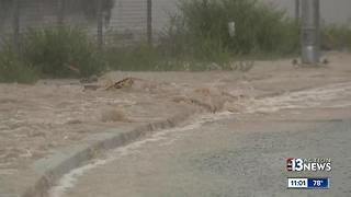 Rain, flooding, water rushing through streets in northwest Las Vegas