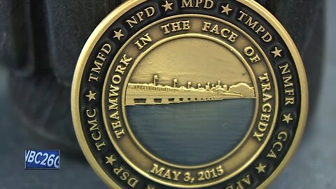 Commemorative coin remembers Trestle Trail Bridge shooting