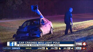 Car crashes into light pole in Fort Myers