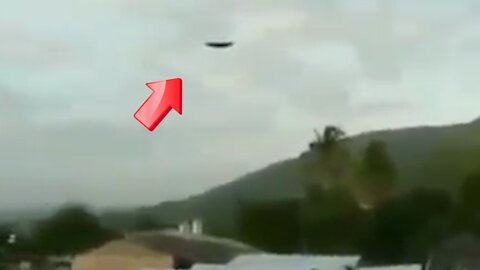 Saucer-shaped UFO leaving at the speed of light over a residential area [Space]