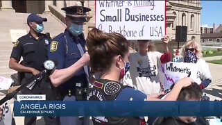 Dozens of people turn out to Operation Haircut protest in Lansing