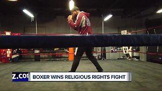 Boxer says he won round one in fight for religious rights