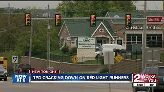 TPD patrolling shopping center intersections looking for red light runners