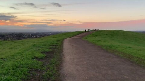 Evening Hiking at Montgomery Hill Trial Surrounded by Rape Blossoms and Rainbow Clouds.