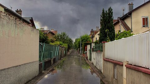 Rain on a quiet backstreet of Ilot Schoettlé in Mulhouse, France