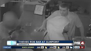 Thieves rob bar at gunpoint