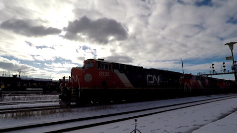 Manifest Train Eastbound CN 3133 CN 3217 & CN 8102 Locomotives In Ontario