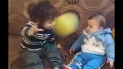 Two Brothers are playing together baby