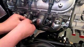 Attaching Plug Wires To Spark Plugs On An LS3 Engine