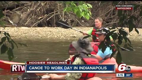 Dozens of people including Mayor Joe Hogsett canoed to work on Friday