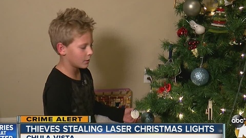 Thieves stealing laser Christmas lights