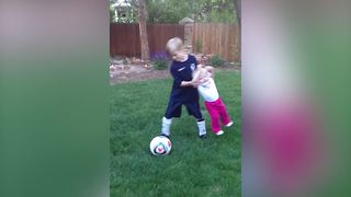 Adorable Tot Girl Learns How To Play Soccer