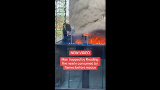 Desperate rescue of a worker amid flames.