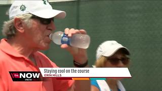 U.S. Open fans, workers deal with the heat