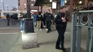 Boston police checking individuals for a possible firearm down Dudley