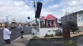 Isaias leaves the sign for Coins Restaurant & Pub in Ocean City destroyed