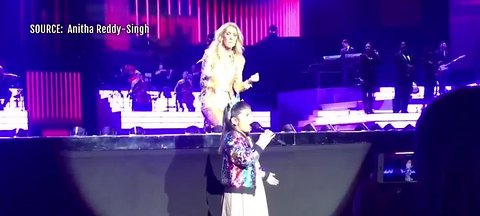 7-year-old girl sings for Celine