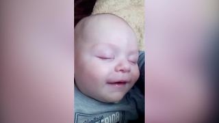 Cute Newborn Baby Boy Makes Funny Faces While He Sleeps