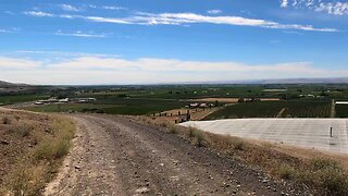 Biking down scenic Washington State mountain ridge in desert with GoPro .