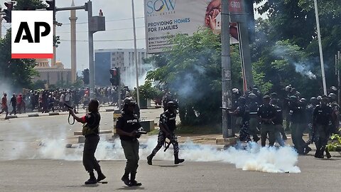 Police fire gunshots, tear gas as thousands protest the crisis in Nigeria | VYPER