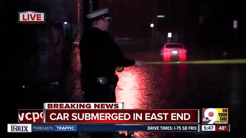 Submerged car stuck near Kellogg Avenue in Cincinnati's East End