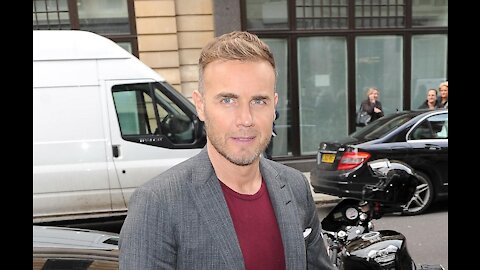 'I didn't care what I was told to do': Gary Barlow defends touching Queen Elizabeth