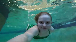 Elizabeth and the Slide N Pool Swim