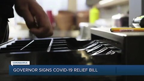 Michigan governor signs COVID-19 relief bill