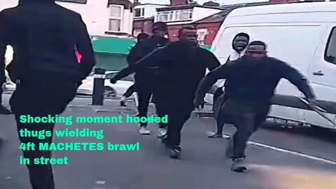 Shocking moment hooded thugs wielding 4ft MACHETES brawl in street