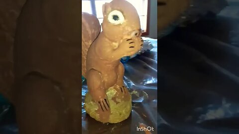 painting a stone squirrel!