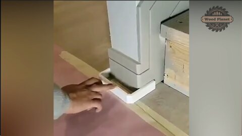 Ninja woodworker fixing the baseboard of the wall | Woodwork Planet