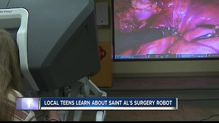 Saint Alphonsus shows surgical robot to local aspiring medical students