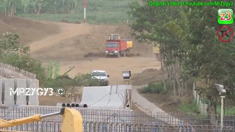 Excavator Dump Trucks Motor Grader Compactor Busy Working On Toll Road Construction