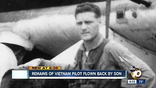 Remains of Vietnam pilot flown back by son