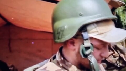 Ukrainian Soldier in Unraininan TV with SS runes on helmet