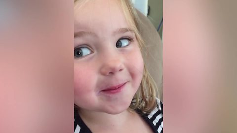 A Tot Girl Makes A Funny Face When She Tells A Lie