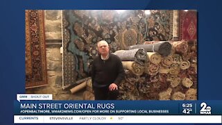 Main Street Oriental Rugs in Ellicott City says "We're Open Baltimore!"