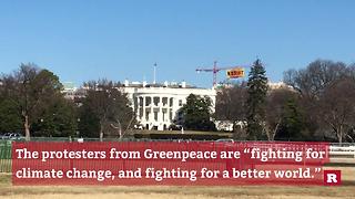 Protesters hang resist sign in DC | Rare News