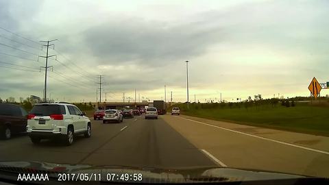 Semi refuses to allow SUV to illegally pass on shoulder