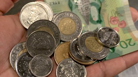 Canada Is Getting A Colourful New $2 Coin & It Could Be In Your Wallet This Week