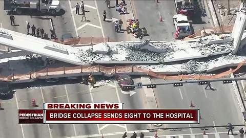 At least one dead in pedestrian bridge collapse at university in Miami, authorities say