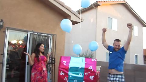 Dad has epic reaction to baby gender reveal surprise
