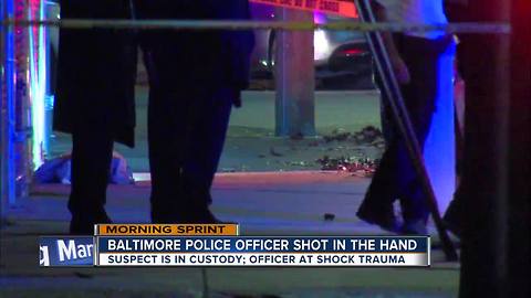 Baltimore Police Officer shot in hand; suspect in custody