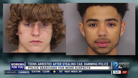 Stolen car rams police cruiser, two arrested