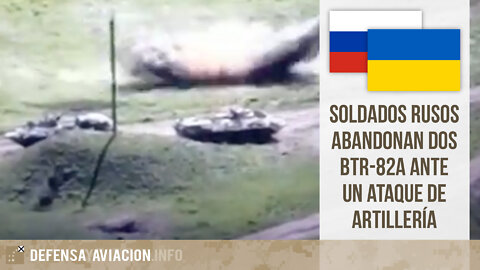 Soldados rusos abandonan dos BTR-82A ante un ataque de artillería