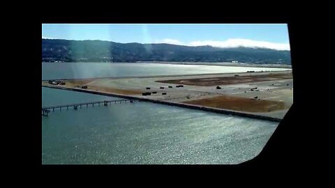 Asiana Airlines Flight 214 - debris field at SFO as seen from landing aircraft on parallel runway