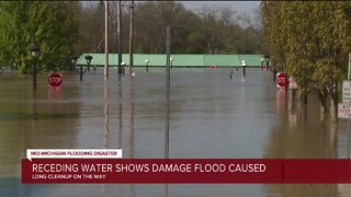 Receding water shows damage from mid-Michigan flood