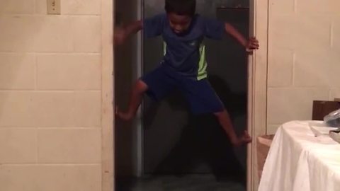 Ninja Kid Climbs Up A Doorframe, But Fails At Getting Down